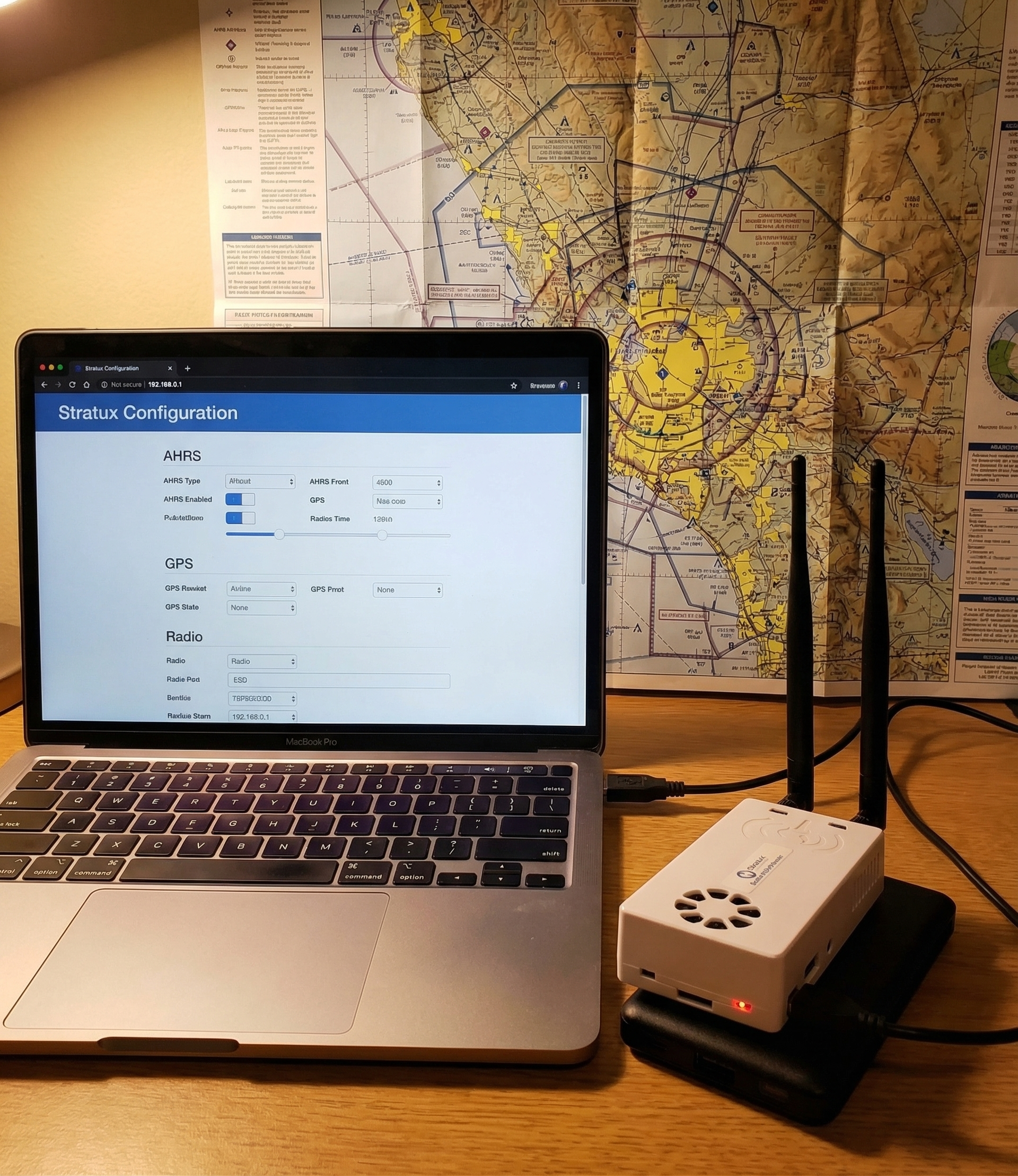 Stratux ADS-B receiver connected to laptop showing Stratux configuration web interface for firmware update